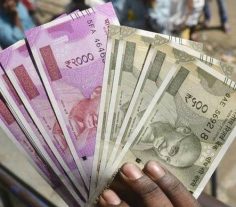 Rupee opens higher against US dollar