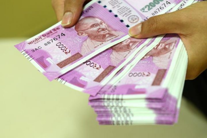 Rupee opens marginally higher against US dollar