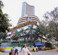 Sensex, Nifty range-bound ahead of Gujarat exit poll results, TCS falls   over 3%