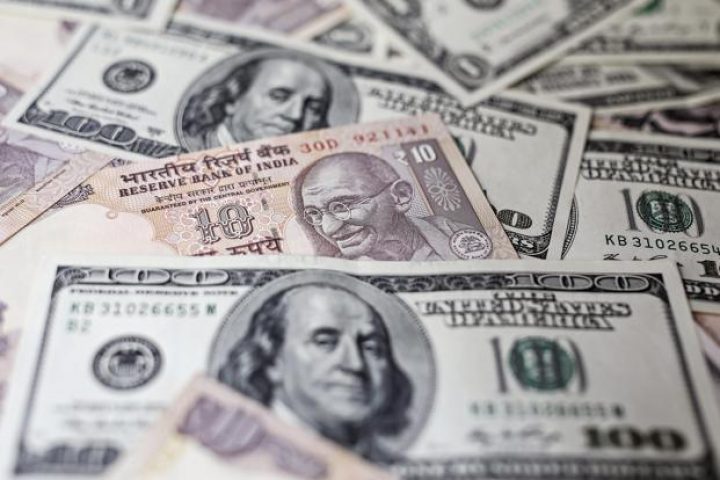 Rupee strengthens against US dollar, hits one-week high ahead of key data