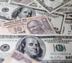 Rupee opens marginally higher against US dollar