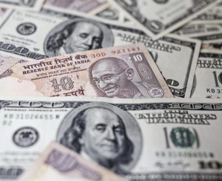 Rupee trades higher against US dollar