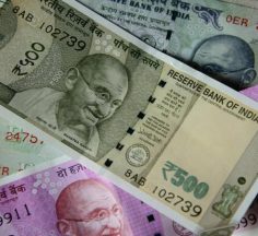 Rupee trades flat against US dollar