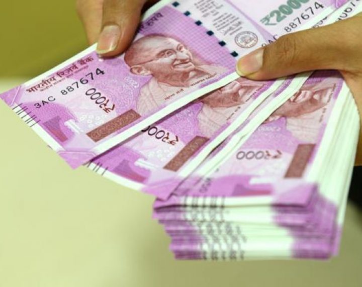 Rupee trades marginally lower against US dollar