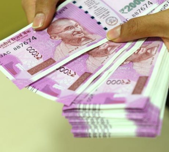 Rupee opens higher against US dollar