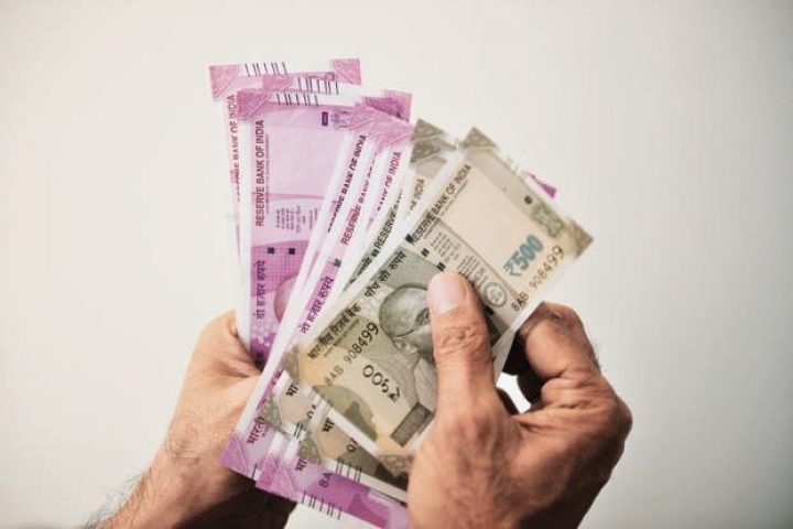 Rupee trades higher against US dollar
